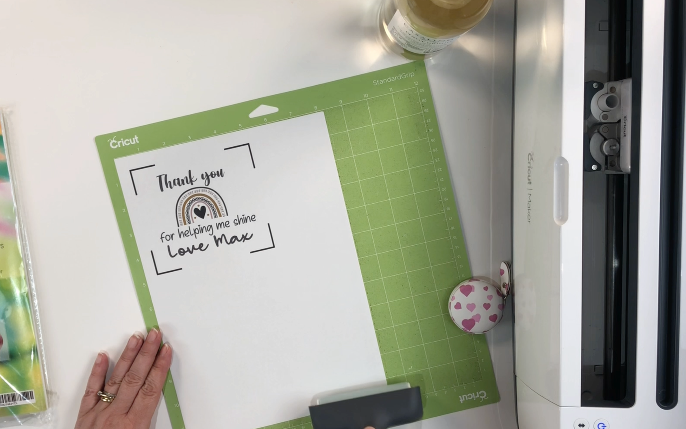 Place the sticker paper on the mat securely.