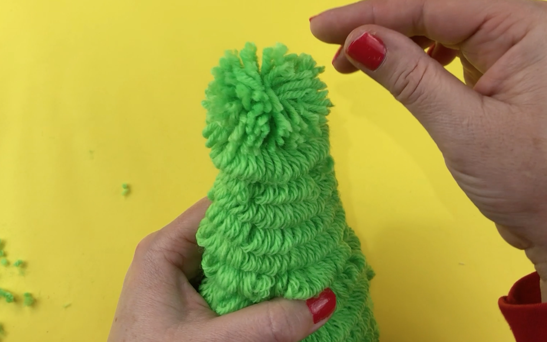 The wool wrapped cone with the pompom on the top
