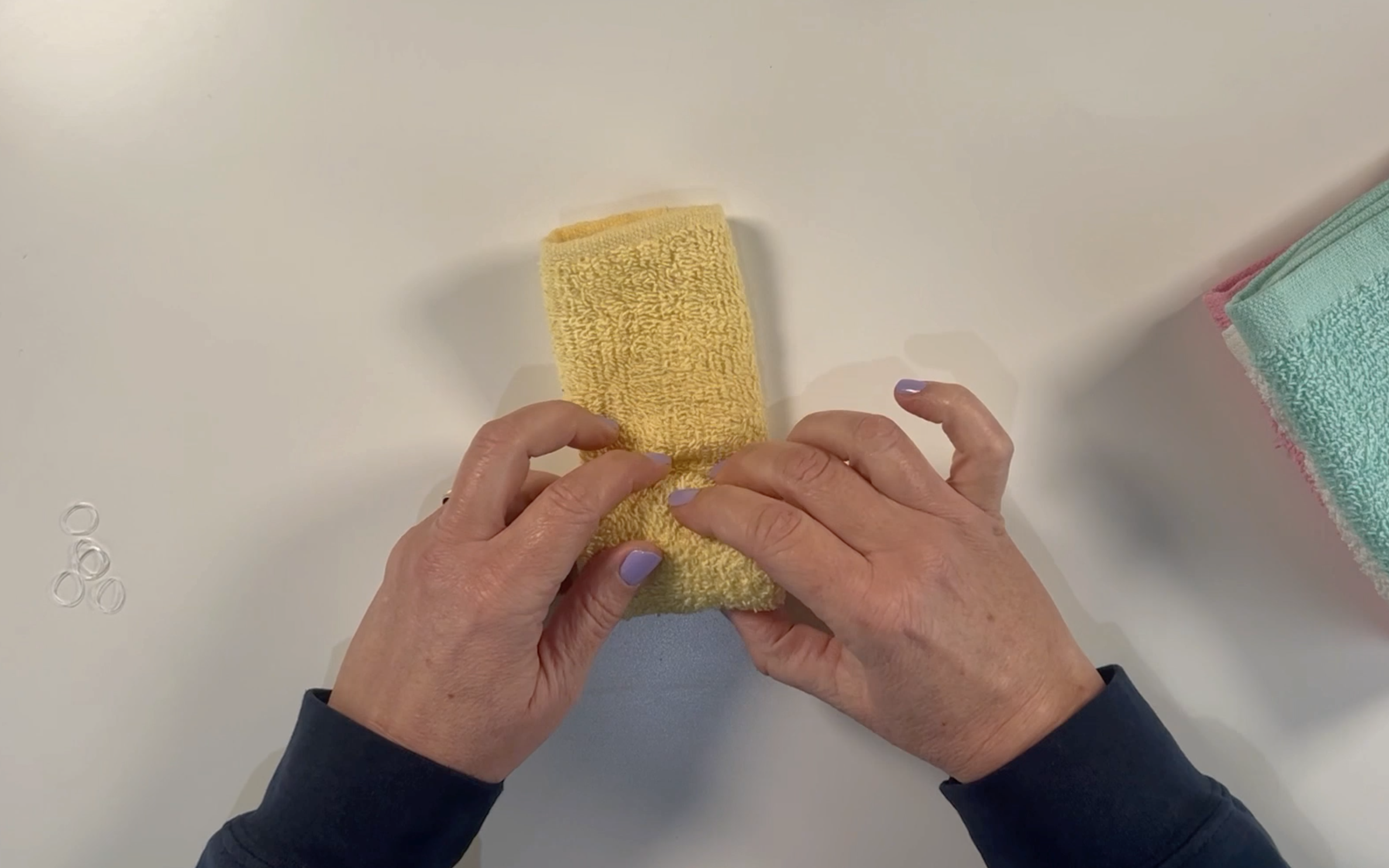 Rolling the washcloth