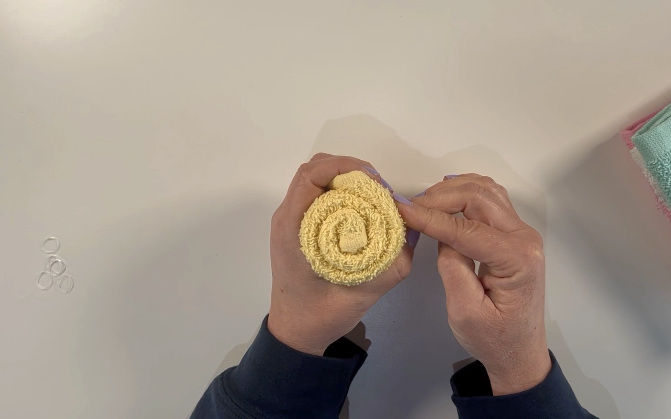 The rolled up washcloth