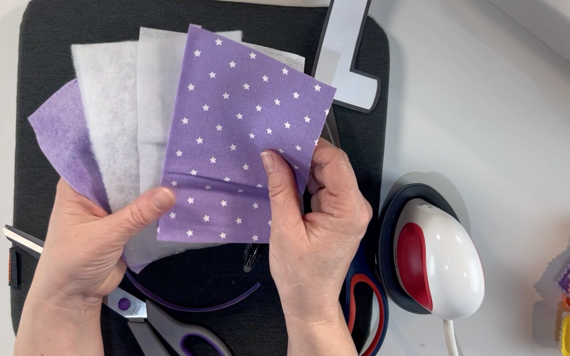 fat quarters, wadding and fusible interfacing that i am using to make the padded letters.