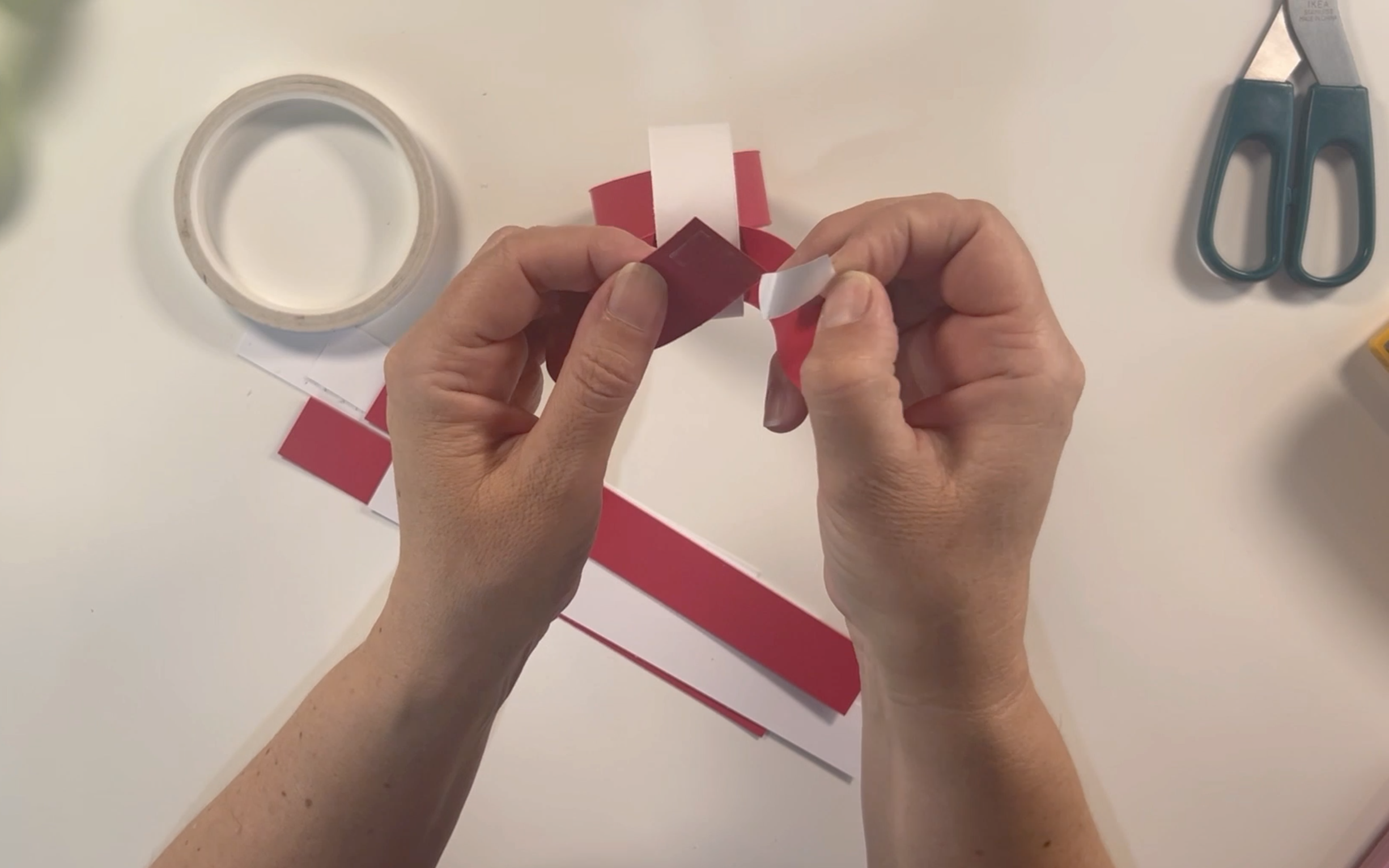 Removing the backing from the double sided tape
